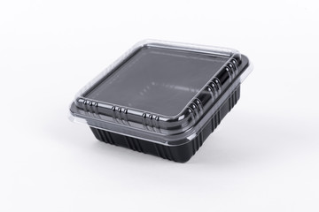 Black Plastic food box package isolated on white background.
