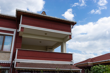 Village House at sunset with Blue Sky