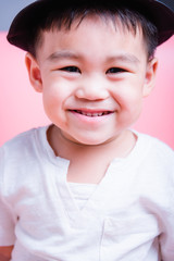 Asian Happy boy child kid he smile in studio