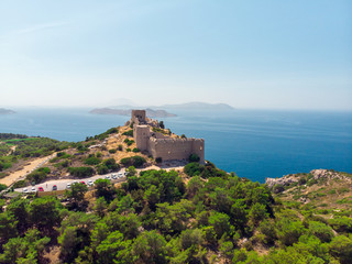 Fototapeta na wymiar Photo of ancient fortress, sea, blue sky, mountain fortress
