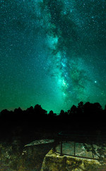 The Milky Way lights up the dark evening sky with its bulk of planets and beauty that is our galaxy. Night photography of the brilliant stars in this dark desert sky