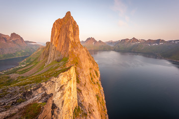 Hiking to Segla Mountain in Arctic summer night. Island of Senja, Norway