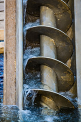 The Archimedes screw, Archimedean screw or screwpump, is a machine historically used for transferring water from a low-lying body of water into irrigation ditches.