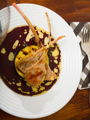 Baked ribs of lamb with eggplant in wine sauce