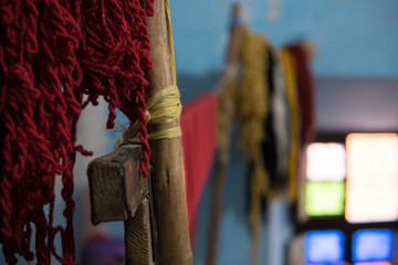 Old style tool for weaving a carpet with traditional techniques on a loom, in the privat family...