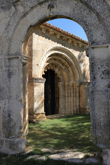 Fototapeta na wymiar Portico, entrance door of the church of San Pedro Apóstol. Villacadima, Guadalajara (Spain)