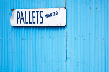 Pallets wanted sign for salvage recycle yard
