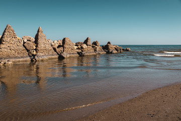 Fototapeta na wymiar Concrete protections for the tides on the beach of Valencia.