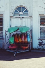 surfboards and canoes in the seaport