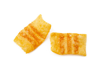 Fried wheat-potato snack with smoked bacon flavor isolated on white background