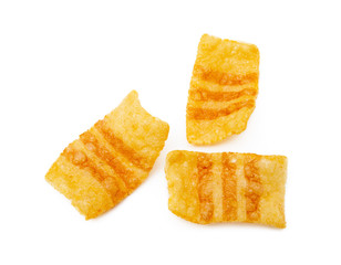 Fried wheat-potato snack with smoked bacon flavor isolated on white background