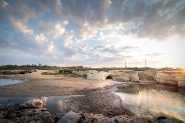 Shot of the Cirica Bay at sunrise. Cirica is a beautiful nature seaside place made of cliffs, rocks and sand in the southern Sicily, Italy