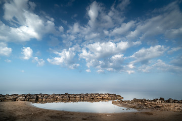 Shot of the Cirica Bay at sunrise. Cirica is a beautiful nature seaside place made of cliffs, rocks and sand in the southern Sicily, Italy