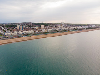 Aerial photo of the Brighton beach and coastal area located in the south coast of England UK that is part of the City of Brighton and Hove, taken on a bright sunny day