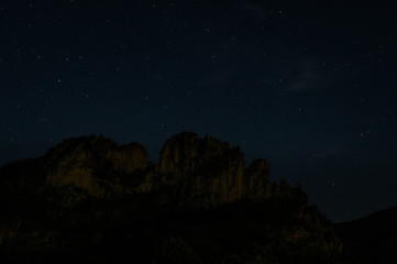Fototapeta na wymiar Moonlight on Seneca Rocks on a Starry Summer Night