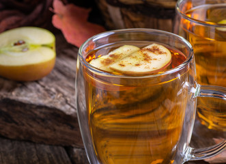 Glass Mug of Cider With Apple Slices