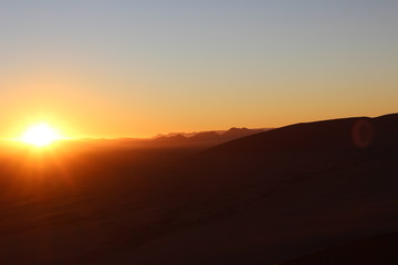 sunrise in namib desert from dune 45