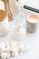 White real home decor, ceramic interior details with vases and candles
