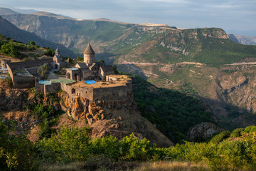  Tatev Monastery. 8th century, Ancient monastery, located in Armenia, Syunik Province , Tatev village.  Tatev monastery almost at sunset. beautiful landscape