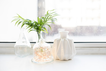 White real home decor, ceramic interior details with vases and candles