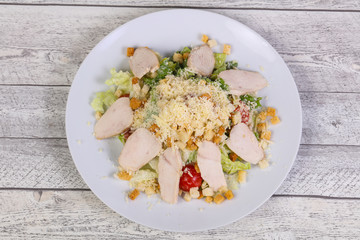 Caesar salad with chicken breast
