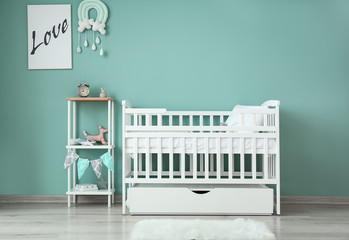 Interior of modern baby room with crib
