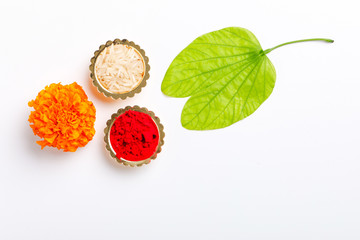 Happy Dussehra greeting card , green leaf, Rice and kumkum © Niks Ads