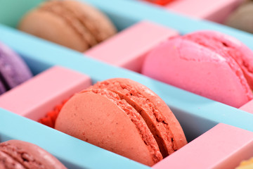 Close up image of pastel colored macaroons.