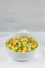 Russian salad Olivier with potato carrot green peas