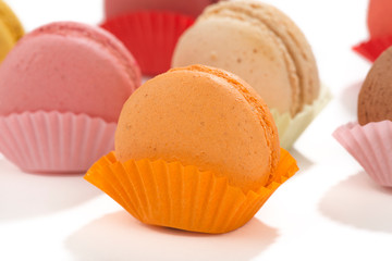 Close-up of assortment of macaroons over white background. 