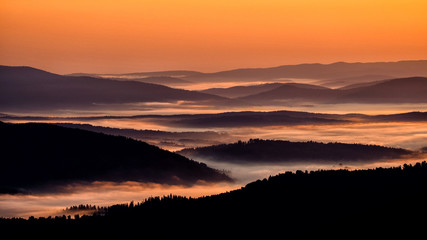 Beautiful misty sunrise in the mountains. Bieszczady Mountains. Poland.