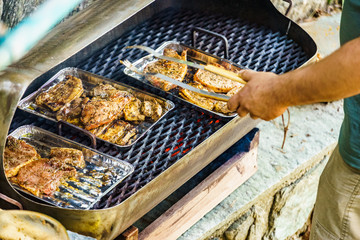 Meat grilling on grill