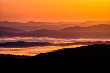 Beautiful misty sunrise in the mountains. Bieszczady Mountains. Poland.