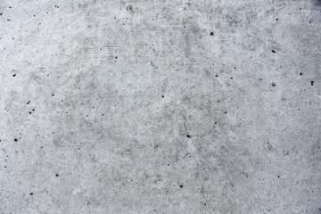 Betonwand mit Spuren in grau