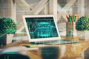 Multi exposure of chart and financial info and work space with computer background. Concept of...