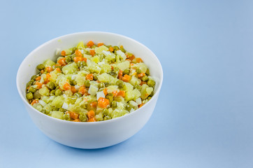 Russian salad Olivier with potato carrot green peas