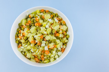 Russian salad Olivier with potato carrot green peas