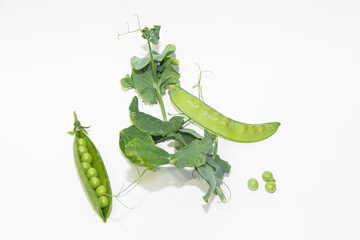green peas isolated on a white background. healthy nutrition. fresh vegetables