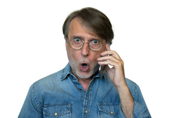 Surprised facial expression talking on the phone