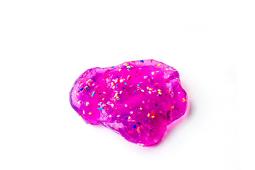 Modern toy for kids called slime. Transparent purple mucus isolated on a white background.
