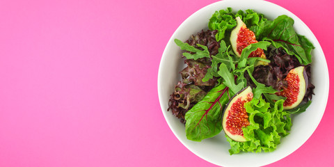 salad figs, leaves lettuce (chard, onions, herbs and other ingredients) top concept. food background. copy space