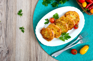 Tasty fried hot sandwiches with minced chicken on a white plate. Top view.