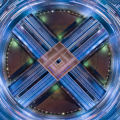 Background Cross X concept  made from Circle of Traffic light tail seem like electron that is a heart of infrastructure road and economic system transportation and communicationv