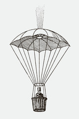 Man with top hat sitting in a basket under a descending parachute. Illustration after an antique wood engraving from the 19th century