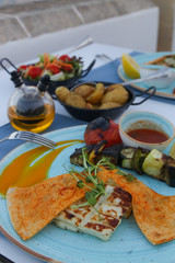 Nicely arranged colorful dinner with side dishes in the Mediterranean restaurant