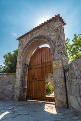 Gateway to the ancient Albanian church in the Kish village