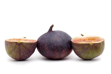 three purpel brazil figs isolated on white