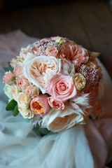 the most beautiful flowers, magnificent bouquets of flowers on the leg in the interior of the restaurant for a festive floristry store or wedding salon for the bride or groom, a bridal bouquet, butane