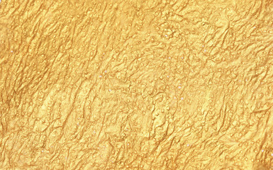 Gold (bronze) glittering color surface. Abstract texture background..