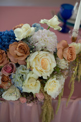 the most beautiful flowers, magnificent bouquets of flowers on the leg in the interior of the restaurant for a festive floristry store or wedding salon for the bride or groom, a bridal bouquet, butane